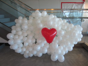 SuccessFactors logo with balloons