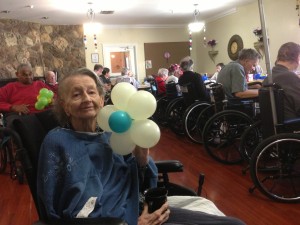 Nursing home resident with flower